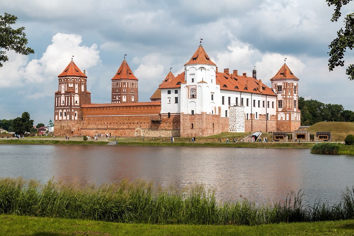 Mir Castle's towers seen across the lake